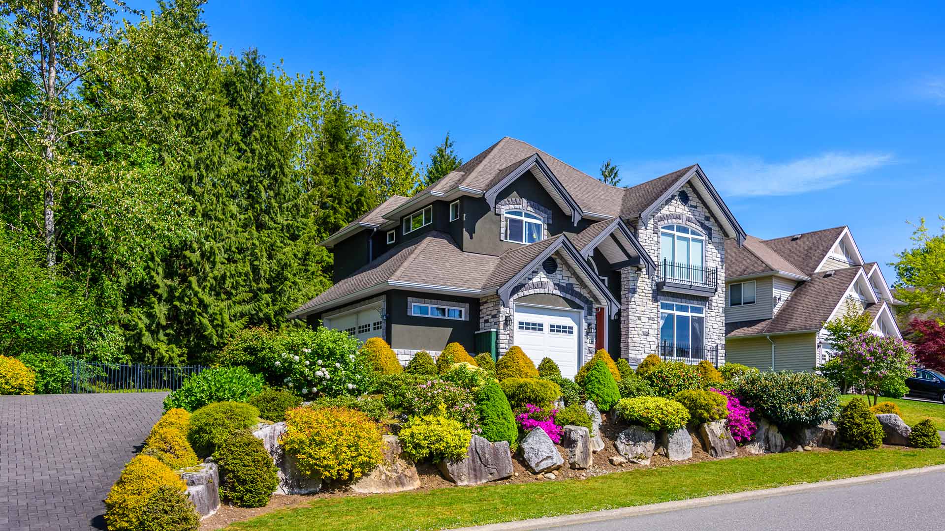 Beautiful home with an imaculate walkway and stunning landscaping in Weddington, NC.