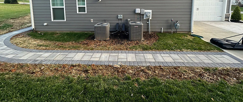 Flawless paver walkway that wraps around to the back yard from the front near Ballantyne, NC.