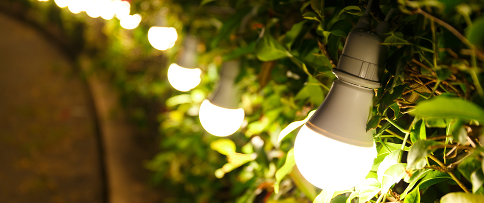 Beautiful lighting surrounding a new patio near Ballantyne, NC.