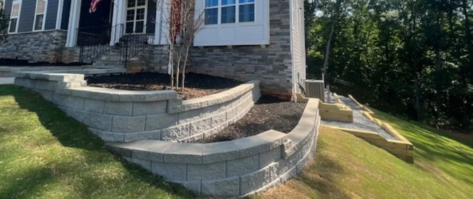 Retaining wall on a sloped property in Huntersville, NC.